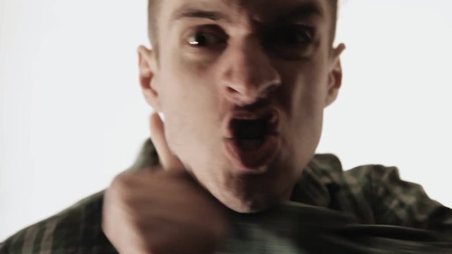 Angry Man screaming and Punching Camera Danger Violence
