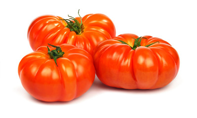 Fresh ripe red tomatoes Timento sort isolated on white background.