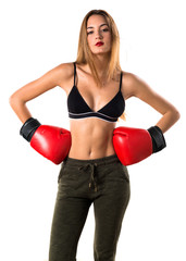 Teen girl with boxing gloves