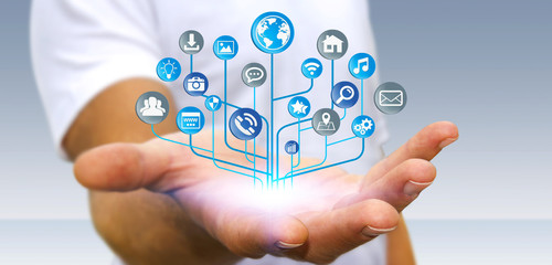 Businessman using modern digital electronic circuit with icons