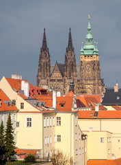 Obraz premium St. Vitus cathedral and roofs of Old Prague