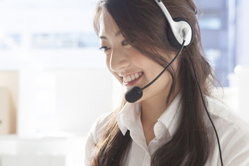 Young woman working in the call center