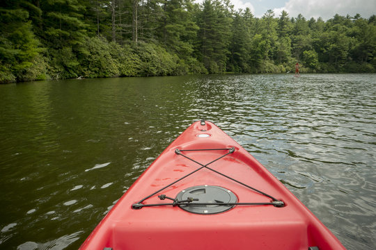 Canoe floating on remote lake