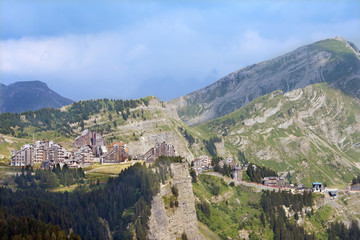 Fototapeta na wymiar The view of european mountain resort in French Alps