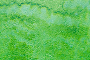 Fototapeta na wymiar green painted paper tissue background