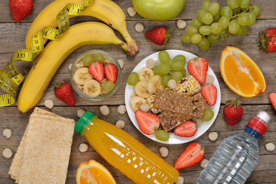 Fruits and cereals on a wooden background