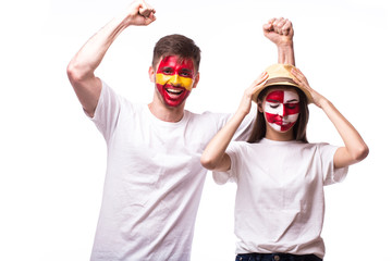 Spain vs Croatia. Football fans of national teams demonstrate emotions: Spain win, Croatia lose. European football fans concept.