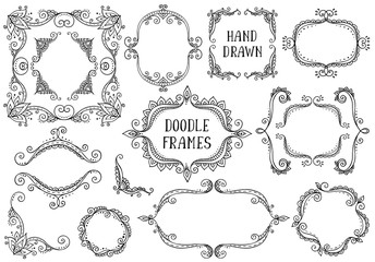 Set of hand drawn vector doodle frames on white background.