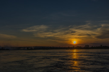 Obraz premium Sunset over the Zambezi River, Zambia, The Zambezi is the fourth longest river in Africa