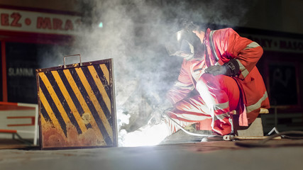 European Caucasian man fixing the rails