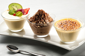 Elegant tray of desserts in glasses