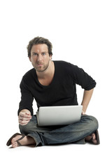 a man with a laptop