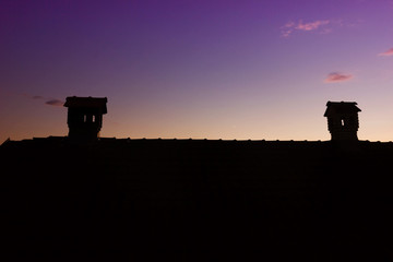 Fototapeta premium Silouhette of Chimney Like A Little House On The Roof