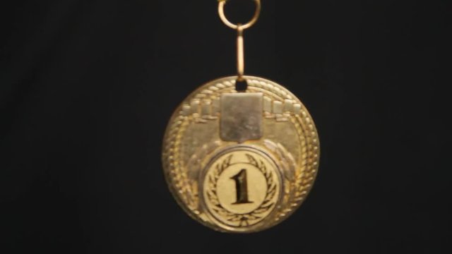 gold medal on a black background 