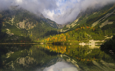 mountain lake
, mountains reflected in the lake
