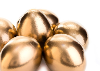 golden chicken eggs closeup