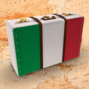 Composite image of italy flag suitcase