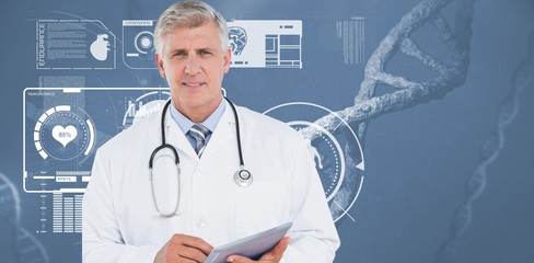 Doctor looking at camera and holding tablet
