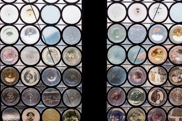 ancient round shaped glass in window