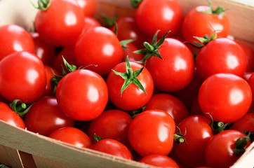 many cherry tomatoes in the basket horizontal