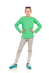 Casual Girl Posing With Hands On Hip