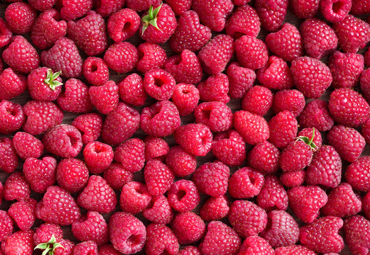 Raspberries background. Close up, top view, high resolution product. Harvest Concept