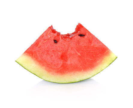 watermelon slice with a bite taken out  on white background
