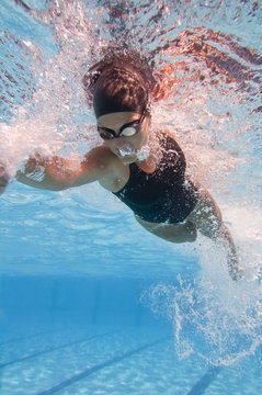 Swimming freestyle, underwater view