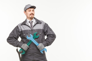 Fototapeta na wymiar Worker in uniform with wrench