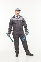 Worker in uniform with wrench
