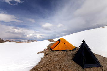 Tents in snow mountains
