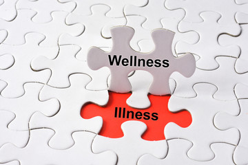 Fototapeta premium Wellness and Illness concept on puzzle