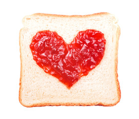 slice of bread with fruit jam heart shape