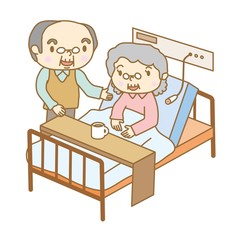 入院中のシニア女性とお見舞い客