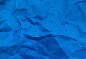 Navy blue color crumpled paper texture background