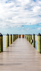 Adirondack Chairs at End of Pier