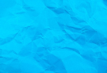 Blue color crumpled paper texture background