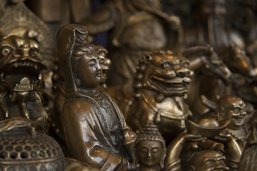 Fototapeta na wymiar Traditional Chinese bronze statues shot in Chengdu, Sichuan Prov