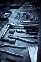 Tools on wooden plank
