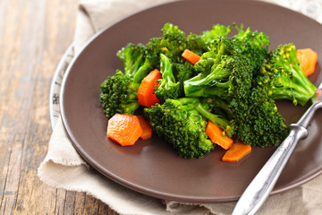 Obraz na płótnie Canvas Steamed broccoli on plate.