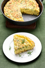 Omelette with herbs, cheese and zucchini