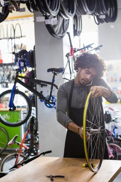Worker repairing bicycles