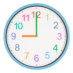Colorful clock showing nine o'clock