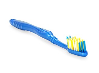 Синяя зубная щетка на белом изолированном фоне