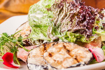 Salad with aubergine, tomato, lettuce leaves