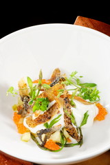 Haute cuisine, River Trout Pouched in the Wine, Under Sauce Hollandaise and caviar