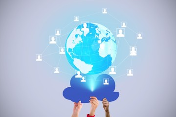 Hands holding cloud against pastel blue