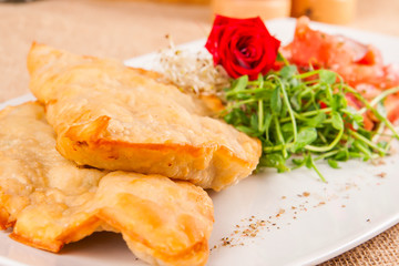 Pasties with tomato and herbs