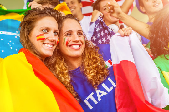 Spanish and Italian Female Fans Together at the Stadium