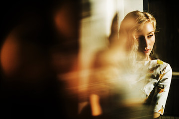 portrait of a beautiful girl in a cafe 